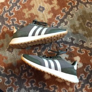Authentic olive green Adidas sneakers